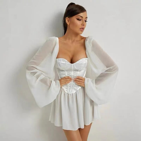 Elegant white mini dress with lantern sleeves